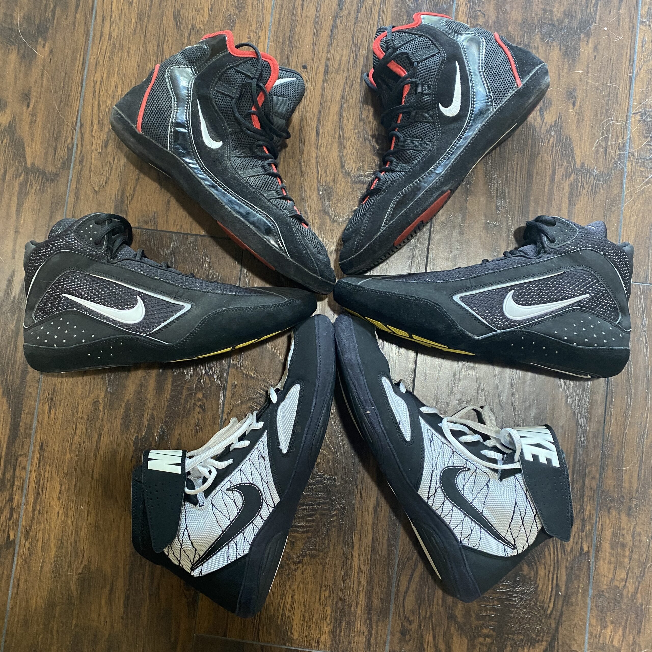 3 pairs of nike takedown wrestling shoes