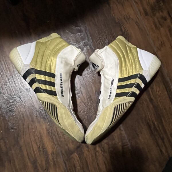 adidas white, gold and black super response wrestling shoes