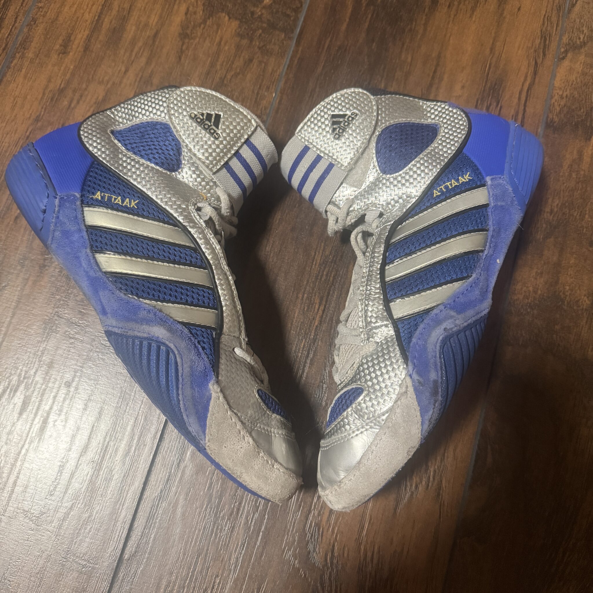blue and silver adidas attaak wrestling shoes